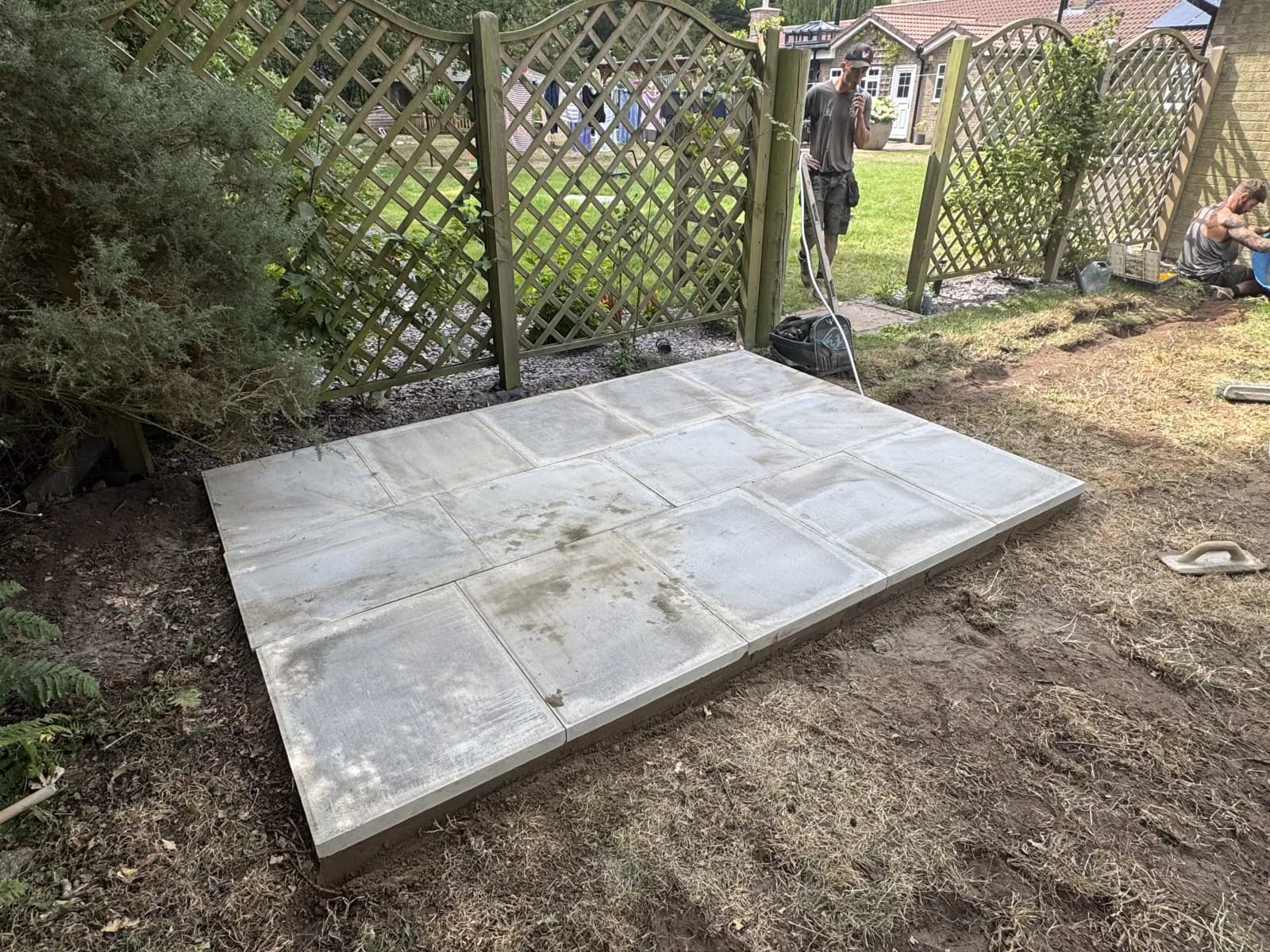 Completed level paving-slab base ready for a bunded oil tank